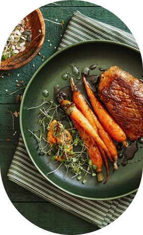 Plated meat dish with vegetables